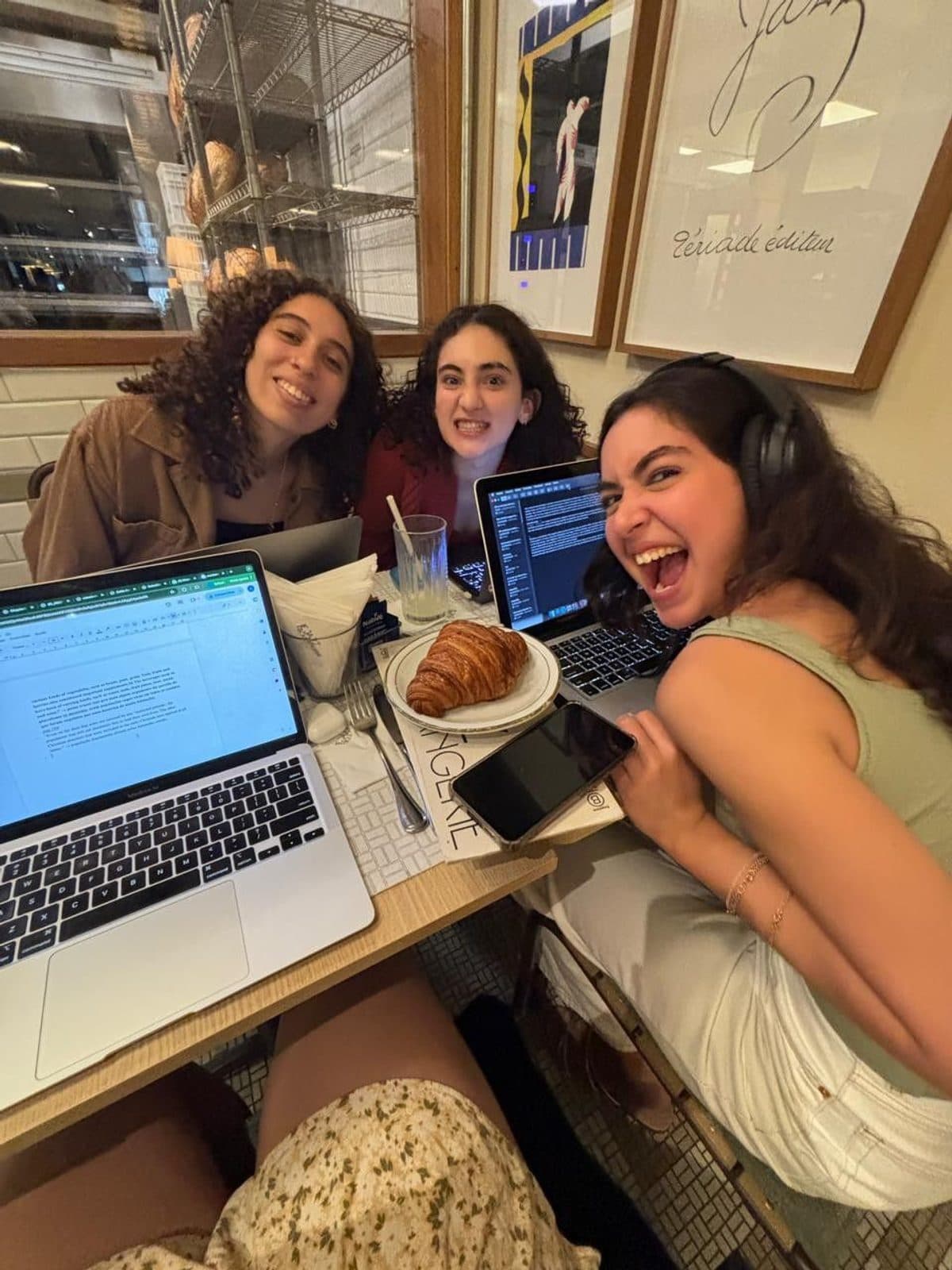Friends studying together at a cafe